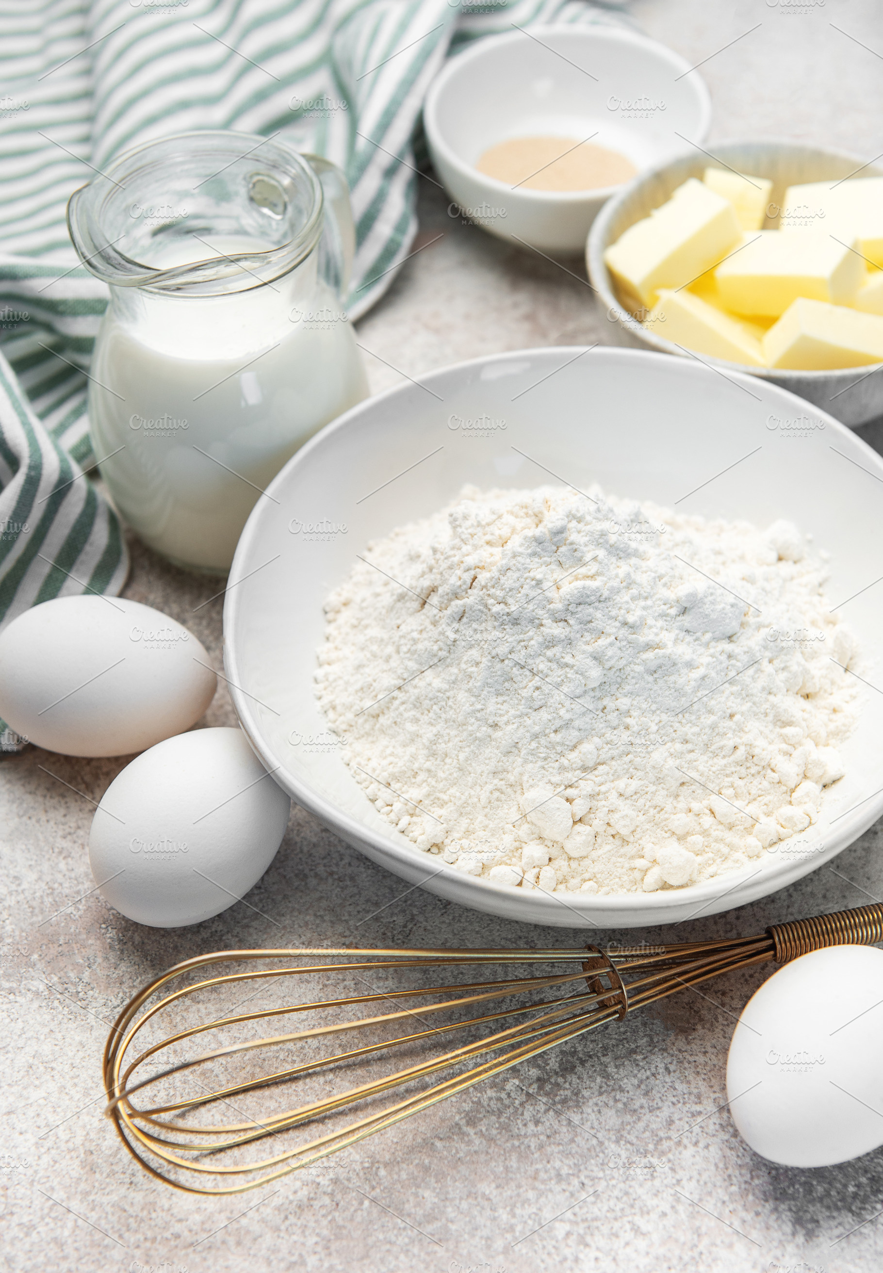 Baking ingredients for making dough and pastry at home, a Food & Drink Photo by Olena Rudo