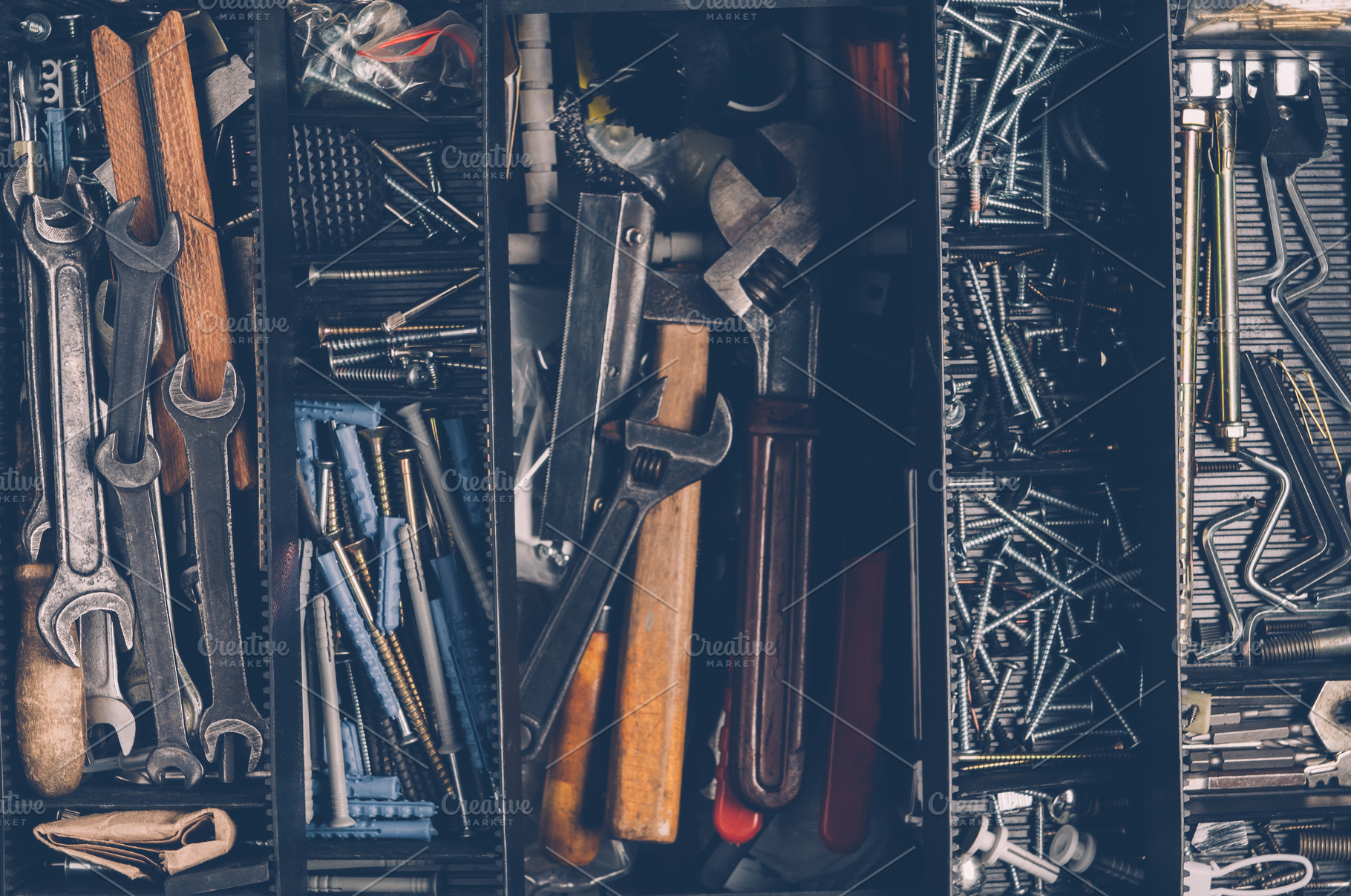 Old tools in a box. Top view, an Industrial Photo by Alekseyliss