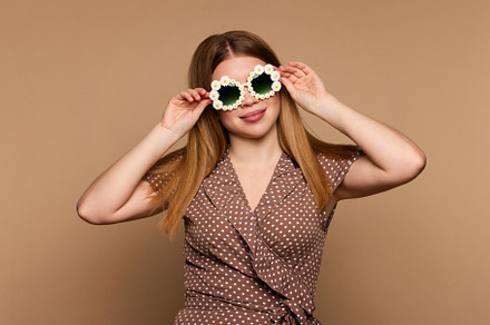 Girl wears beige polka dot dress, a Beauty & Fashion Photo by Elena Vagengeim