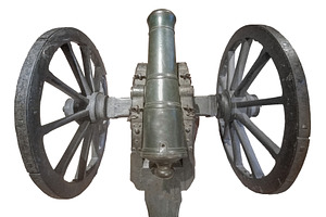 Old bronze cannon with wooden wheels isolated photo, an Arts & Entertainment Photo by DanFLCreativo