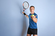 Middle-Aged Tennis Player Holding Racket and Ball, a Sports & Recreation Photo by Davizro's Market (Thumbnail 1 of 2)