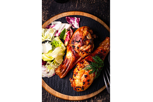 Roasted chicken drumsticks with, a Food & Drink Photo by Yulia Furman