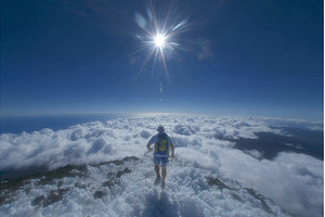 A hiker stands at a viewpoint gazing, a Nature Photo by ZinetroN