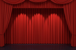 Red stage curtains on stage