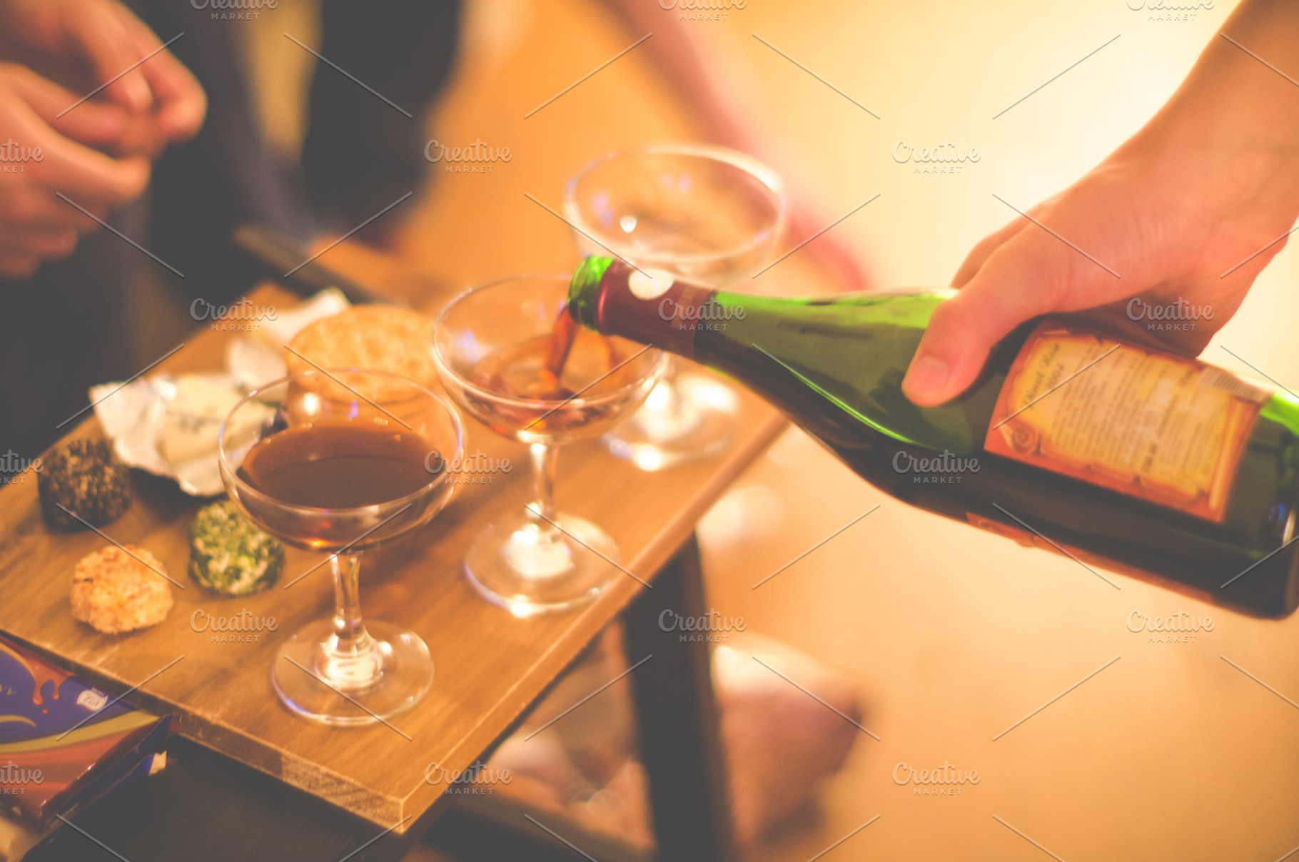 Serving wine, a Food & Drink Photo by LarisaDeac