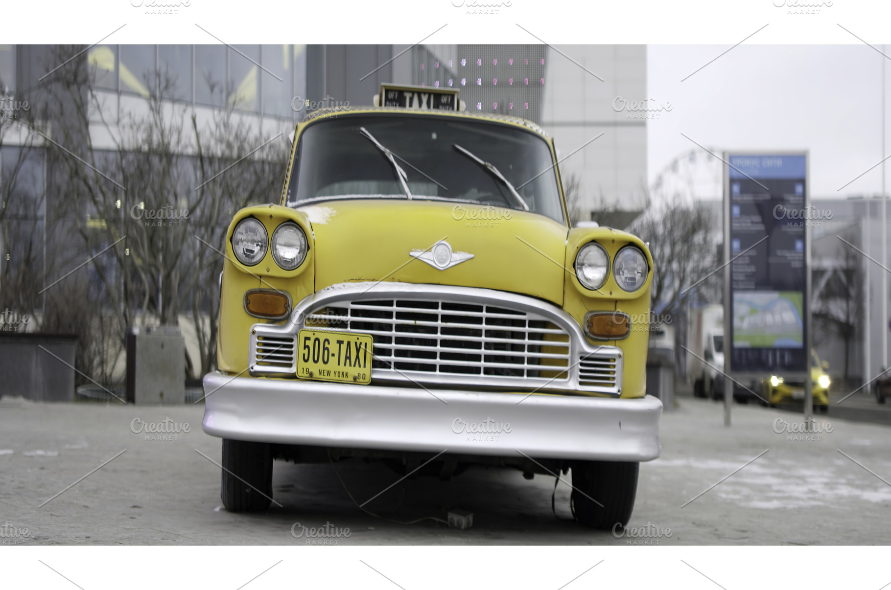 Classic yellow taxi cab parked on, a Transportation Photo by Media Whale Stock
