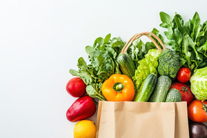Colorful fresh vegetables in a bag, a Photo by Beautiful things