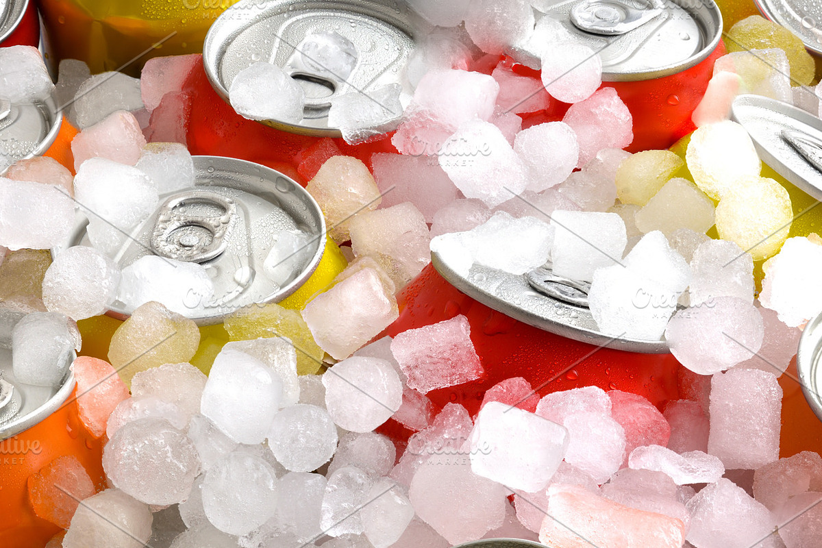 Cold drink cans covered in ice elevated view., a Food & Drink Photo by Davizro's Market (Photo 2 of 2)