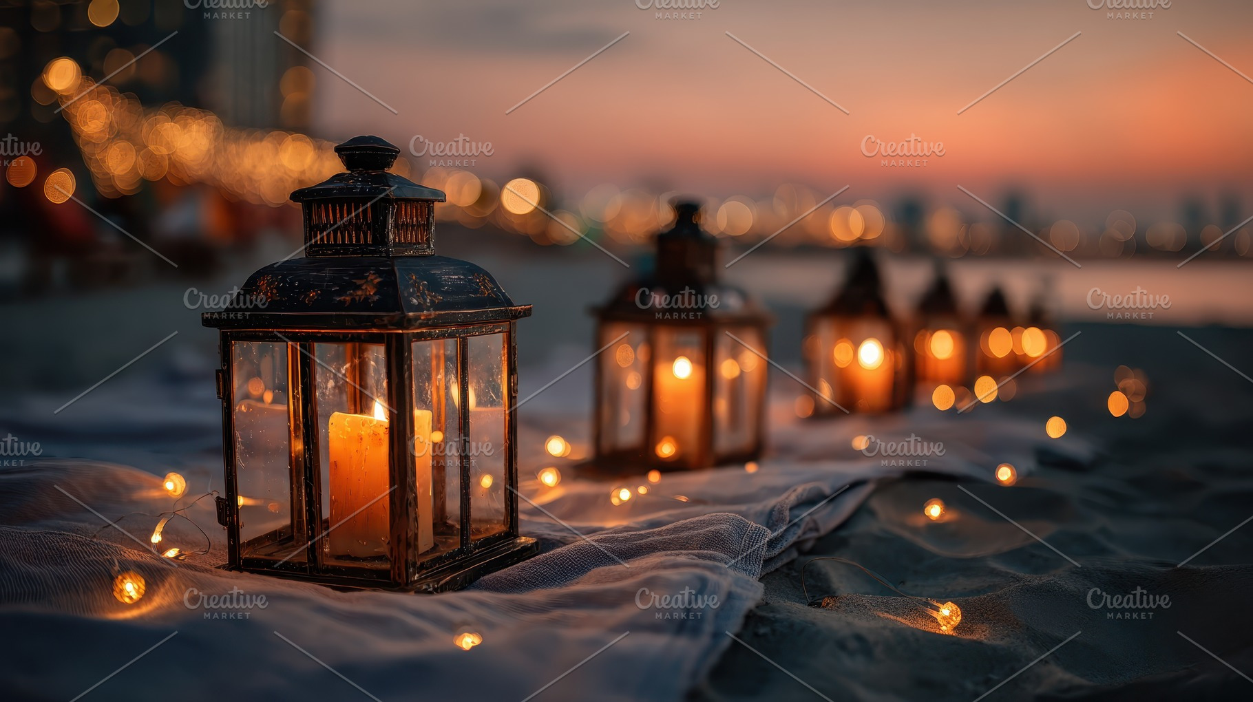 Romantic beach sunset lanterns candl, a Photo by Pixeness Studio