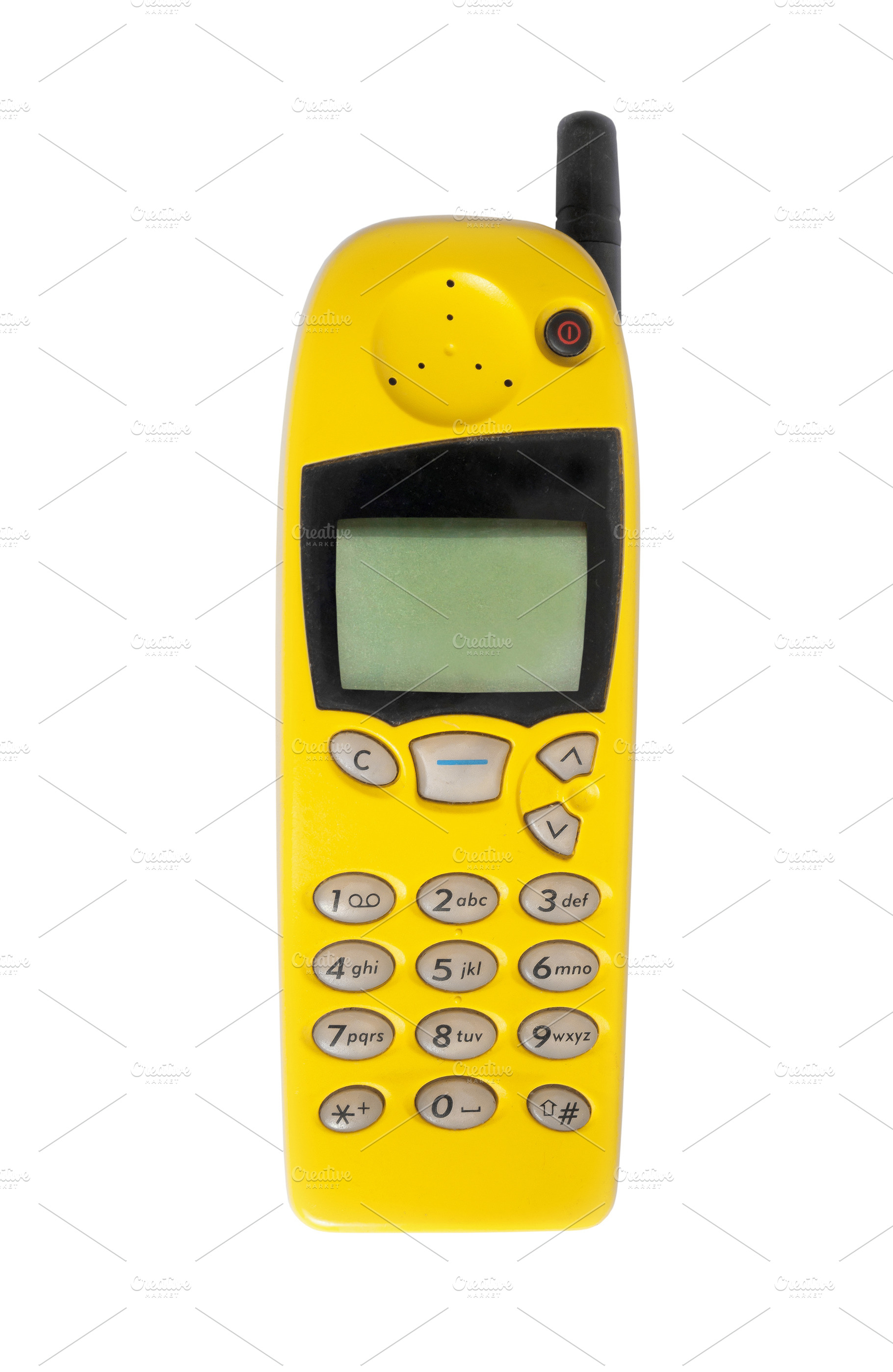 Old yellow mobile phone isolated, a Technology Photo by BOOCYS