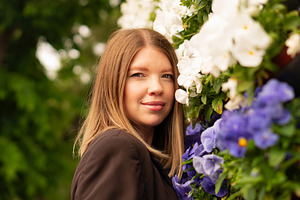 Portrait of smiling young woman, a Person Photo by Elena Vagengeim