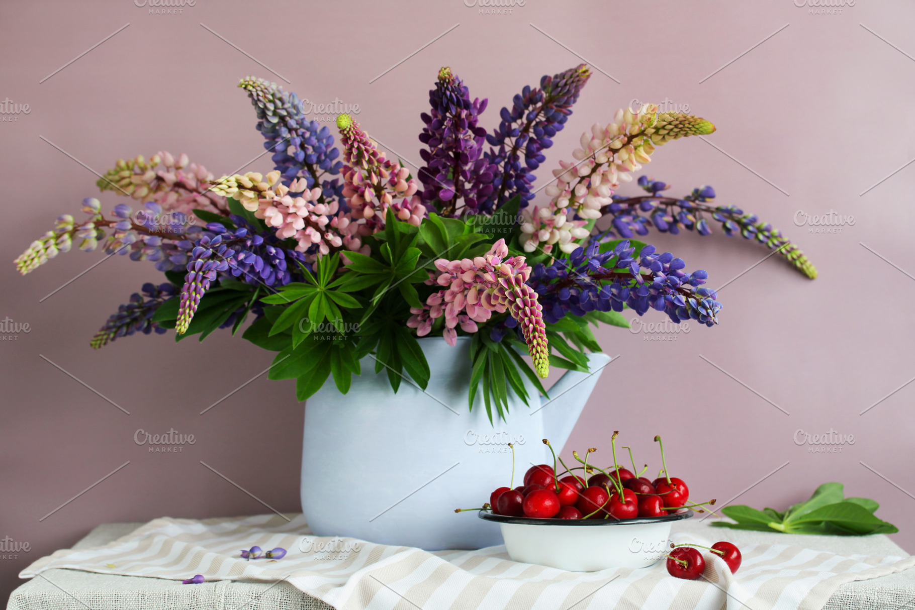 bouquet of lupines in a teapot, a Photo by BalaguR