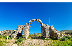 Tingis Gate at Volubilis, a UNESCO world heritage site in Morocco, an Architecture Photo by Leonid Andronov