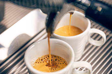Coffee machine pouring espresso