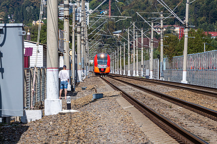 red and orange electric train, a Transportation Photo by Illustrations&photos