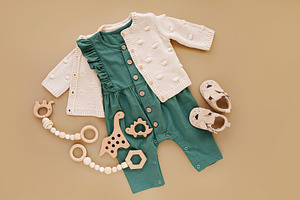 Knitted  jumper with green romper