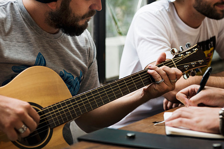 Friends playing music together stock photo containing rehearsal and song, a Person Photo by rawpixel