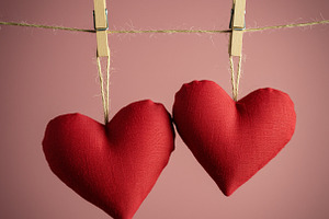Two Red Fabric Hearts on Clothesline, a Photo by IrinaCzaran