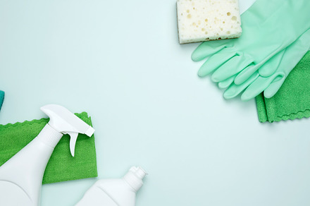 Concept of cleanliness and hygiene. Cleaning supplies and tools, including bott, a Photo by matucha