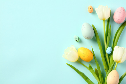 Happy Easter greeting card template. Bouquet of tulips and Easter eggs on paste, a Holiday Photo by photoguns