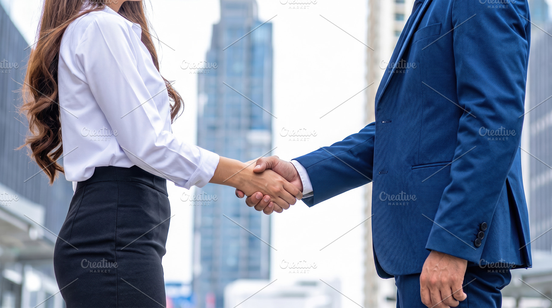 Business Handshake in Modern City Setting, a Business Photo by Davizro's Market