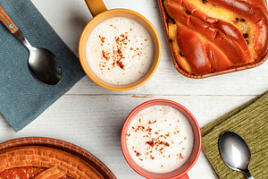 Delicious breakfast with cappuccino, croissant, apricot tart, plumcake and chee, a Food & Drink Photo by Antonio Gravante Market