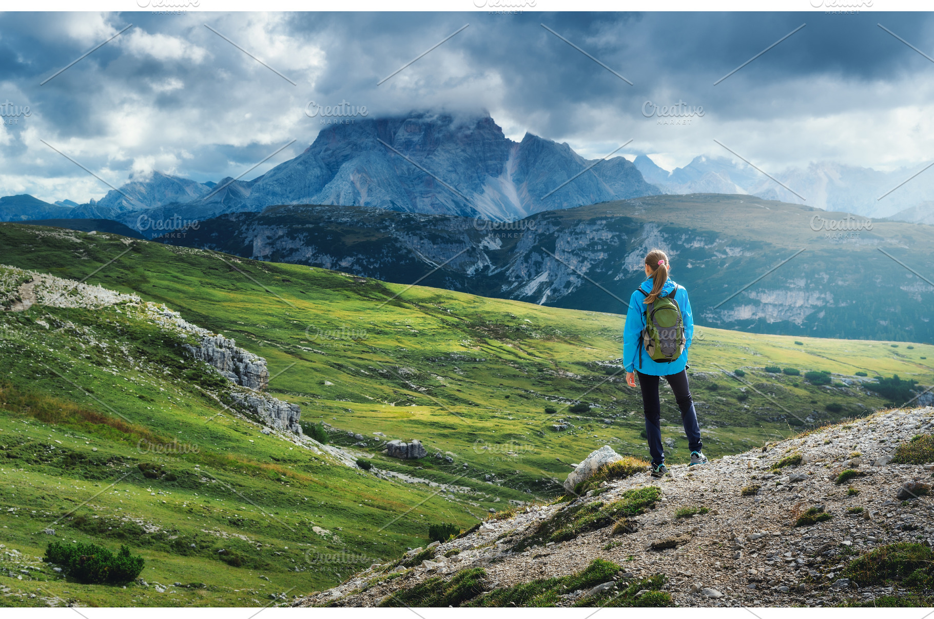 Female hiker enjoying the view of, a Person Photo by den-belitsky
