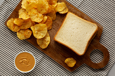 Homemade American Peanut Butter Sandwich on a Wooden Board, top