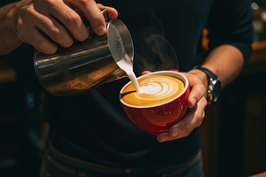 Barista pouring steamed milk, a Food & Drink Photo by professorinc