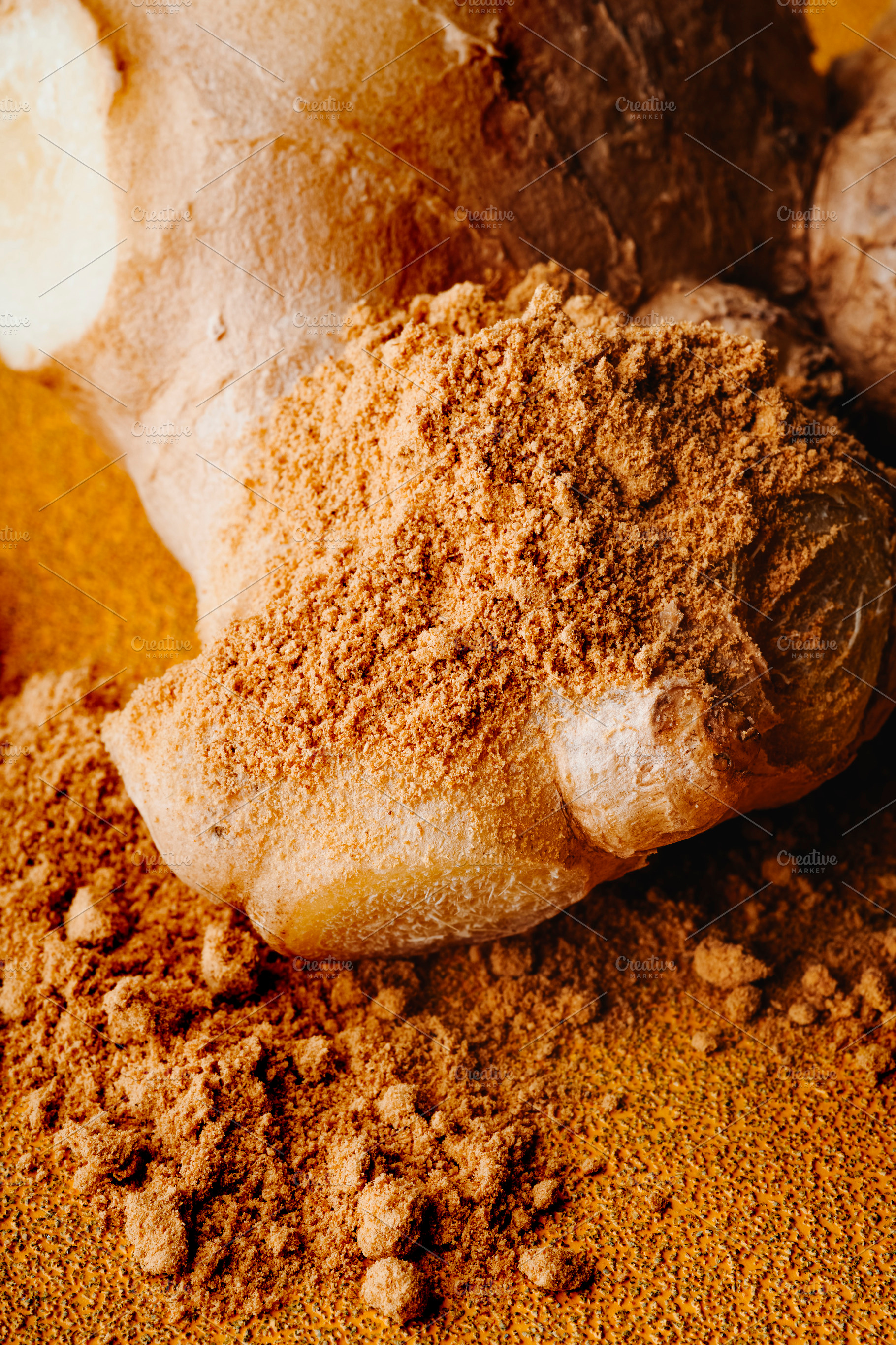 fresh ginger covered with ground spice, a Photo by Nito