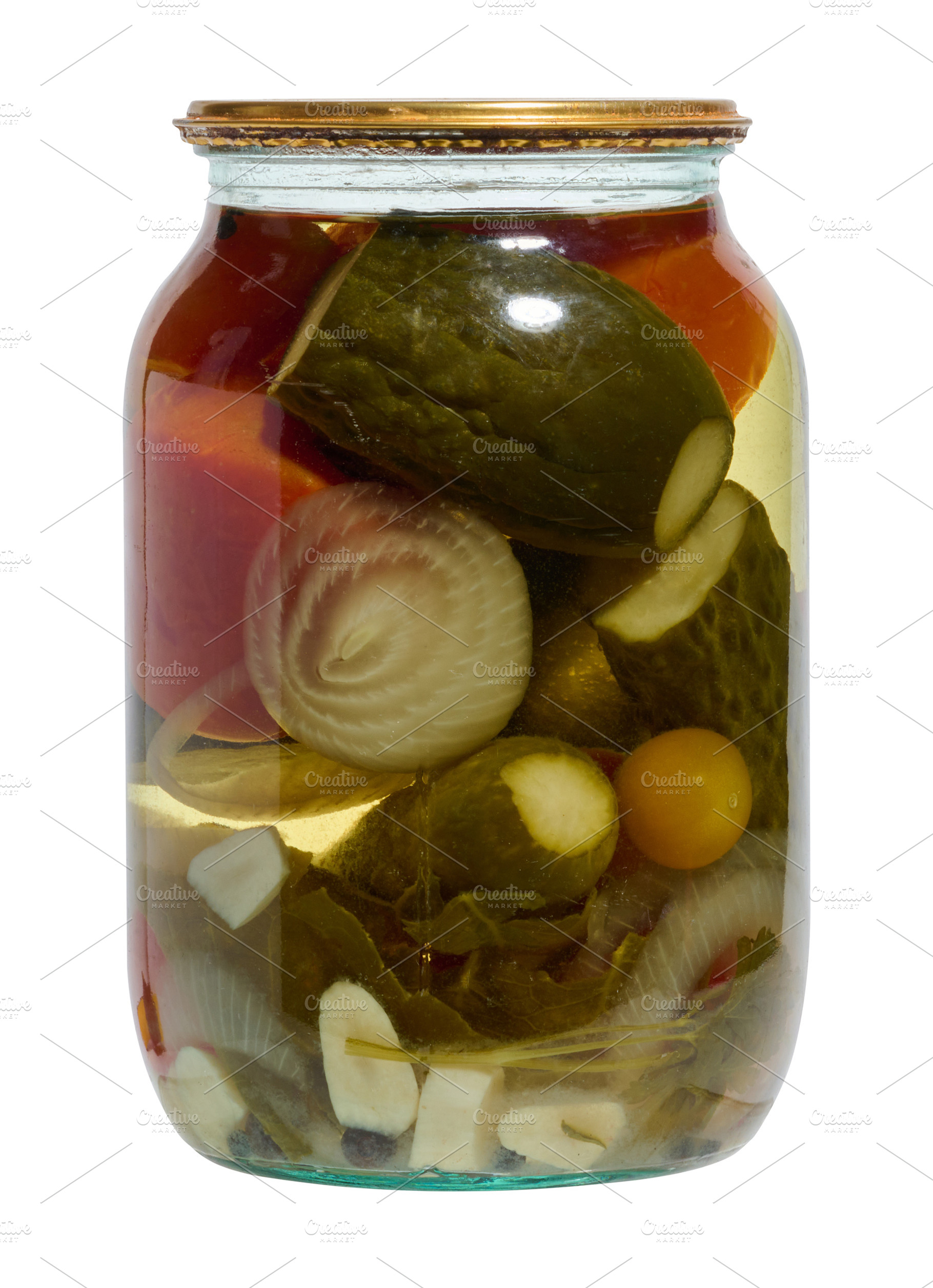 Glass jar with pickled whole cucumbers, red tomatoes, half an on, a Food & Drink Photo by ndanko