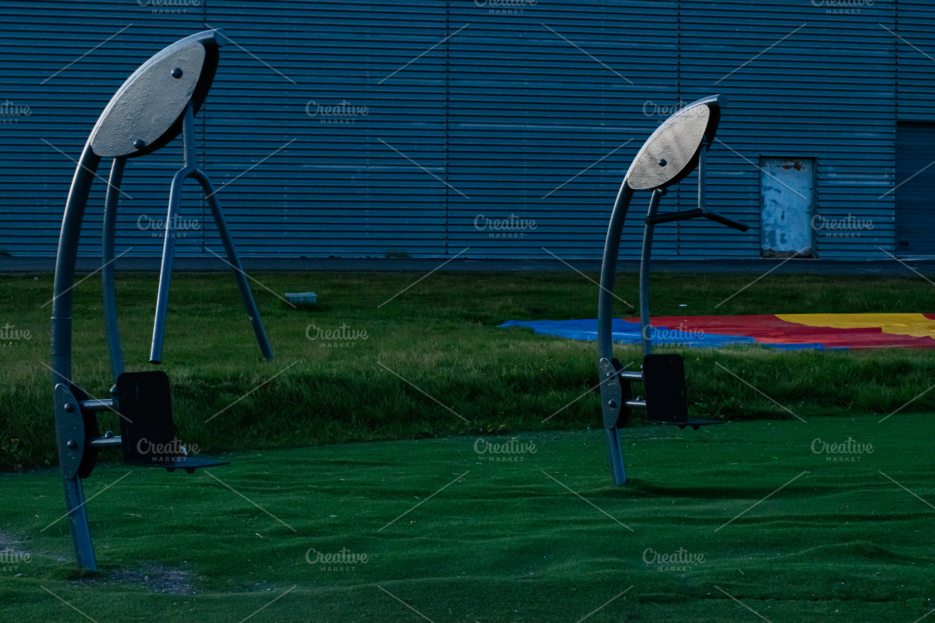Outdoor gym equipment in a park setting, Akranes, Iceland, early evening, a Photo by AS photostudio
