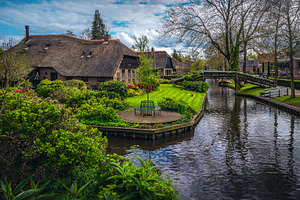 Houses in row on the waterfront, an Architecture Photo by Alpine Dreams
