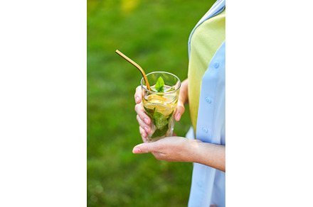 Woman drinking summer citrus, a Food & Drink Photo by IlliaBondarPhotography