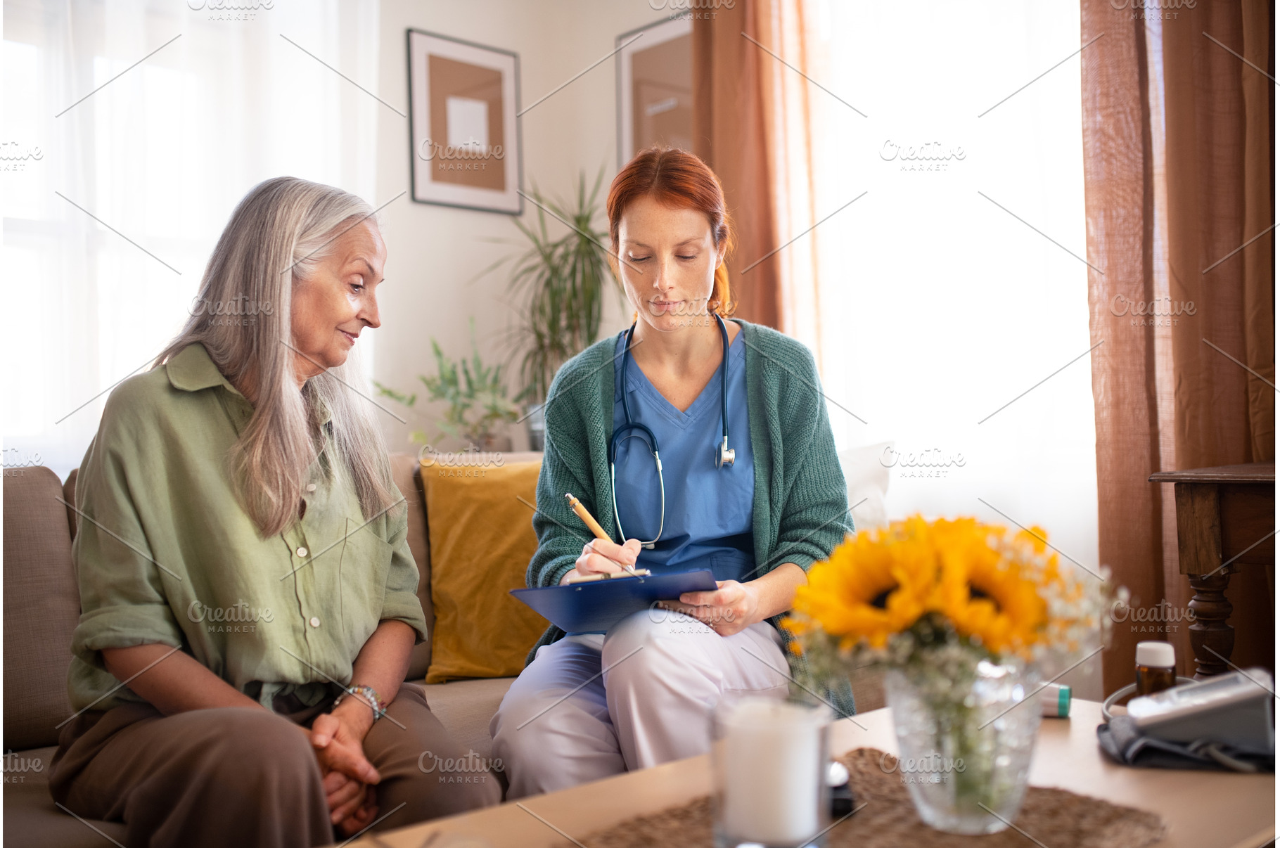Nurse cosulting with senior her, a Person Photo by HalfPoint