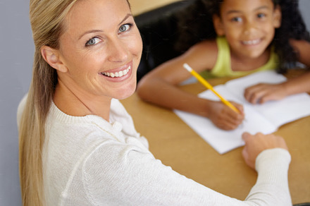 Helping her get to the answer, a Photo by Peopleimages.com