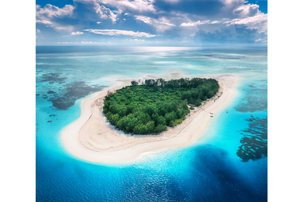 Aerial view of blue sea and Mnemba, a Nature Photo by den-belitsky