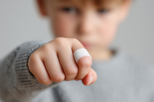 Close up of a child’s hand with, a Health & Medical Photo by MistyDay