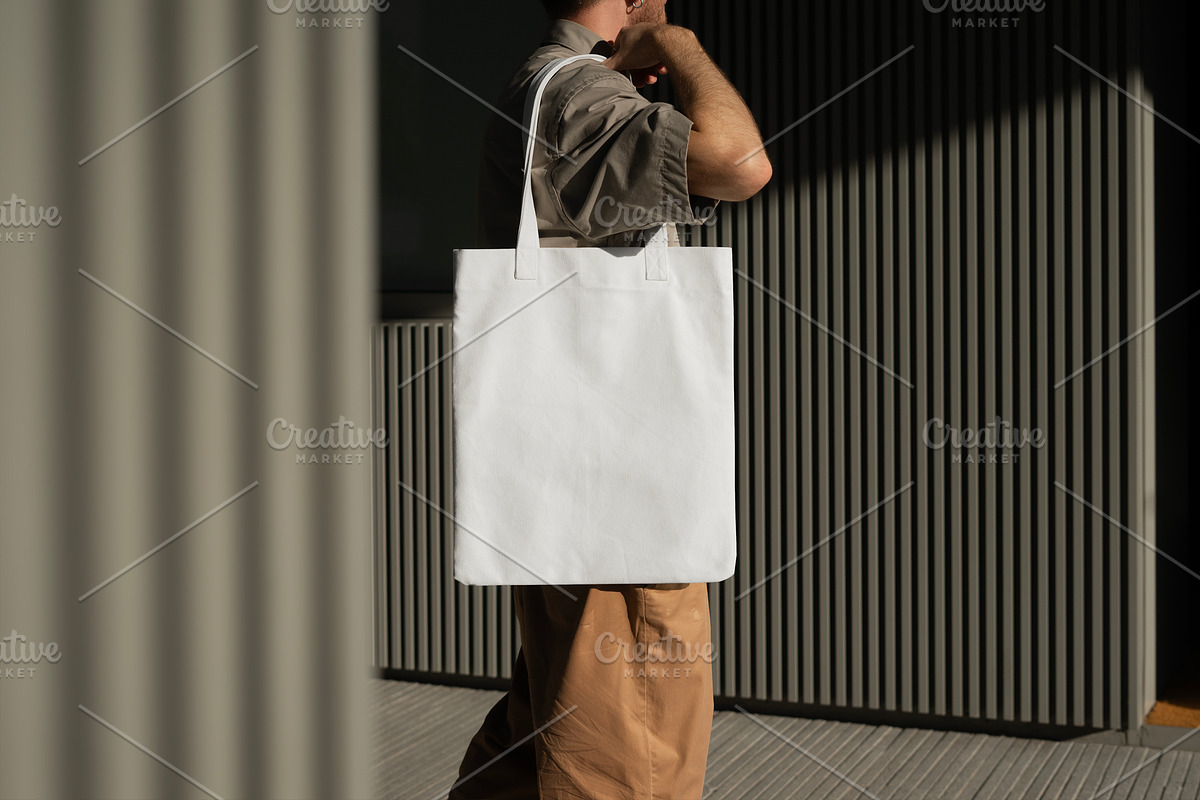 Tote Bag Mockup Urban Style, a Merchandise Mockup by eezo (Photo 4 of 4)