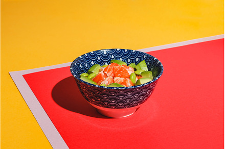 Poke bowl with rice, avocado, a Food & Drink Photo by Irina Burakova