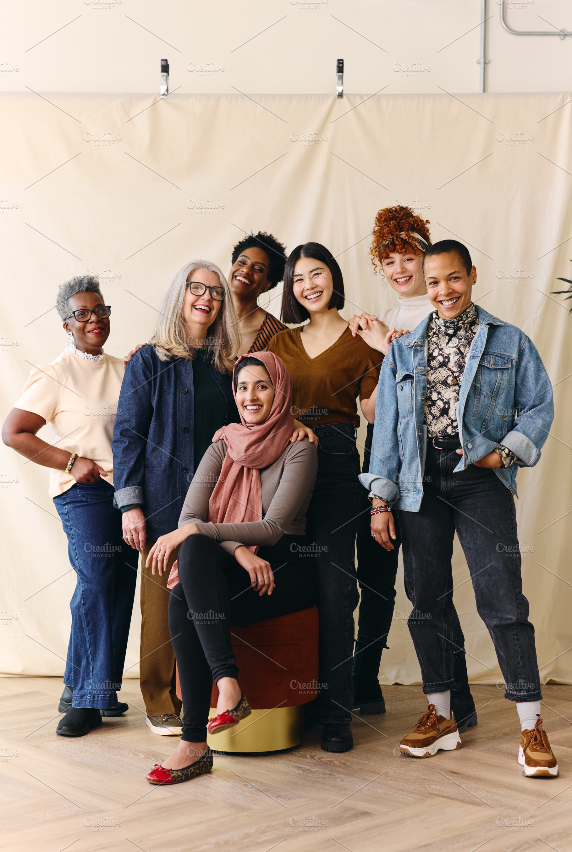 Portrait of mixed age range multi ethnic women smiling in celebration of Intern, a Technology Photo by Southworks