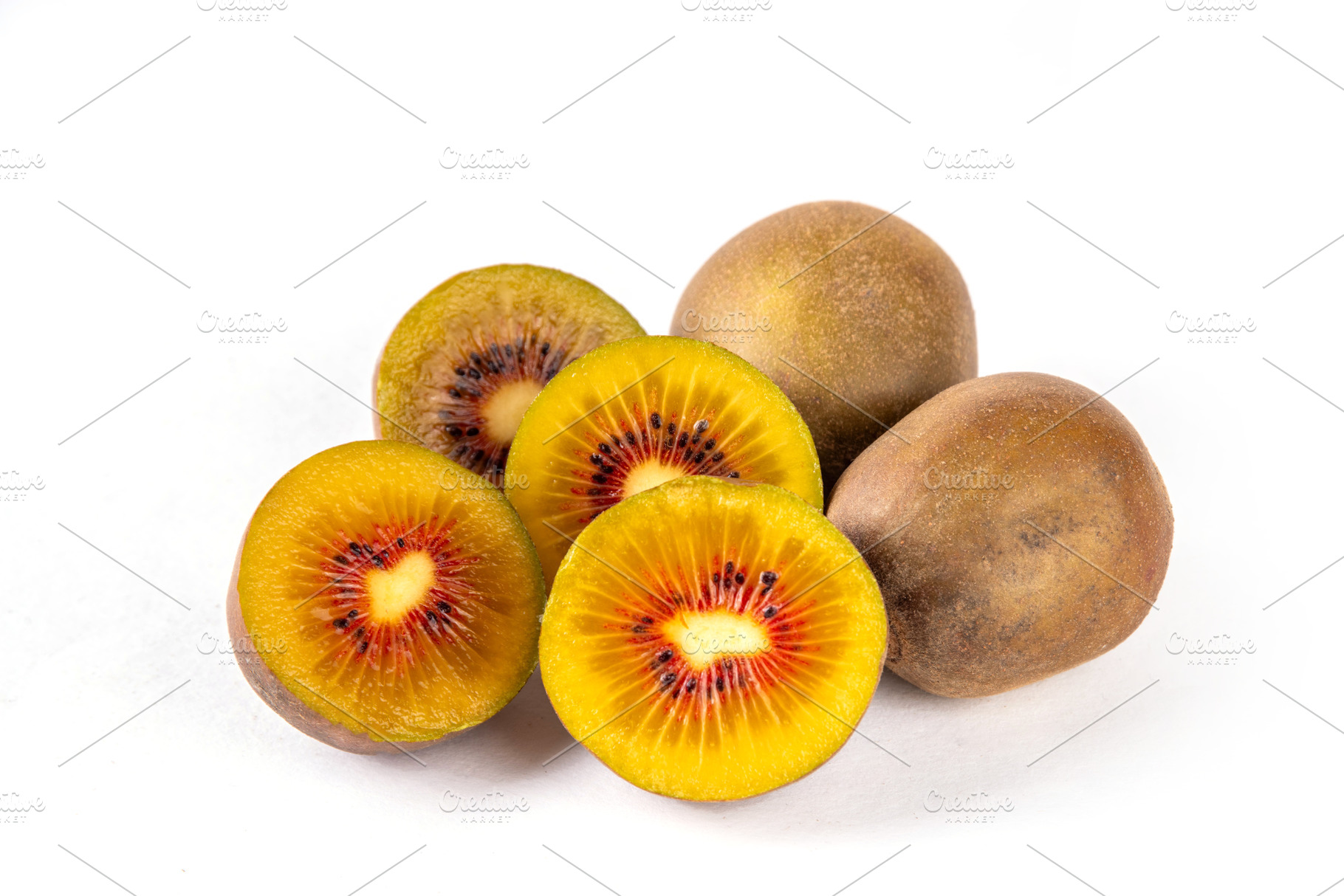 Red kiwi, Sweet bright red colored kiwi fruits, whole and sliced, a Food & Drink Photo by Rimma