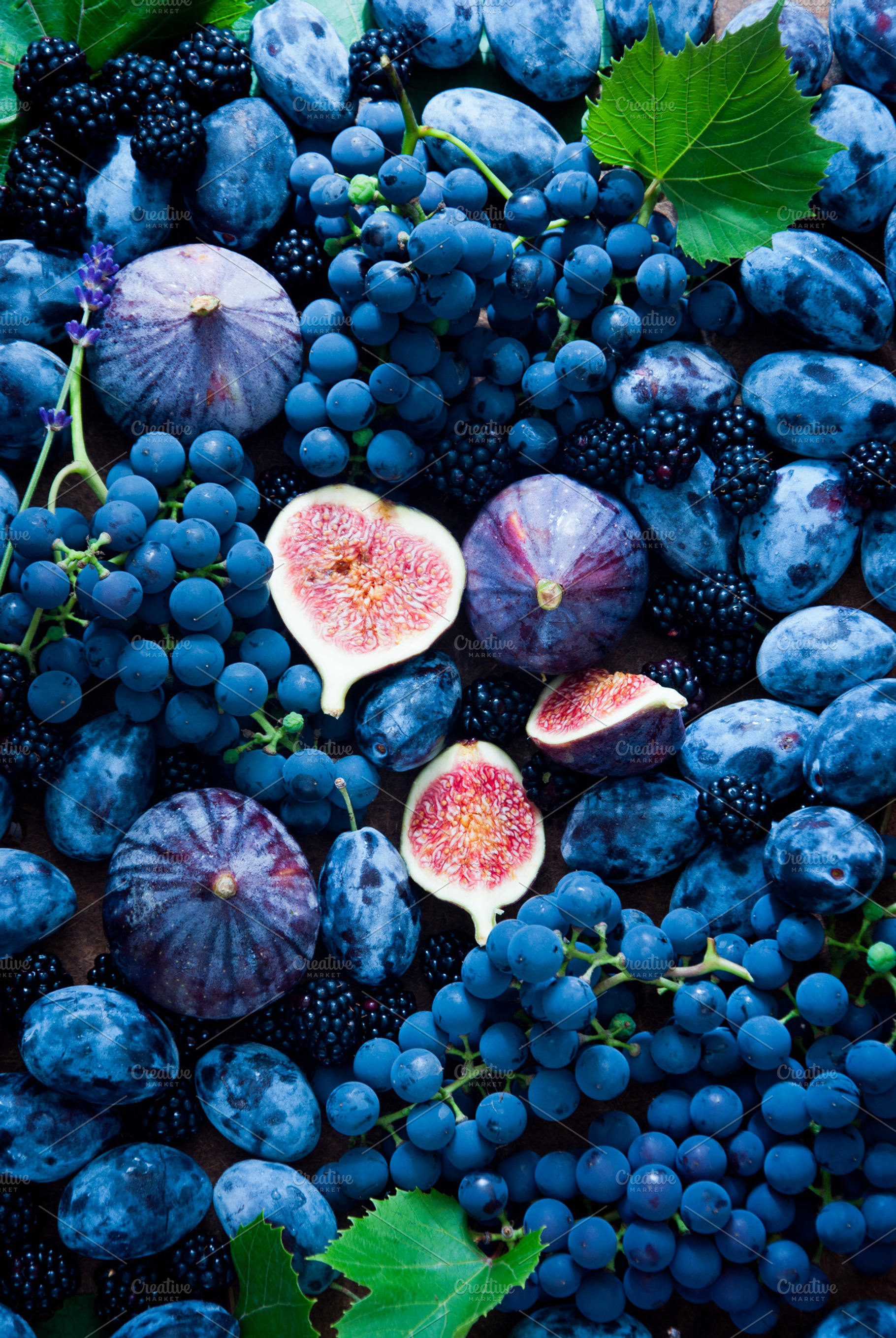 Fresh figs grapes prunes containing agriculture, autumn, and berry fruit, a Food & Drink Photo by letterberry