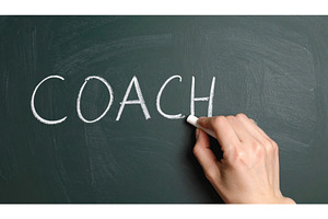 The word coach written in chalk on a, a School & Education Photo by Igor Tichonow