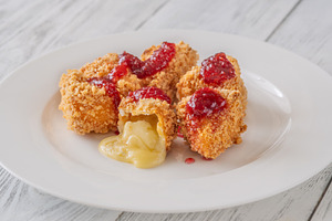 Fried Breaded Camembert With Berry Sauce And Melted Cheese Cente, a Food & Drink Photo by Alexander Prokopenko