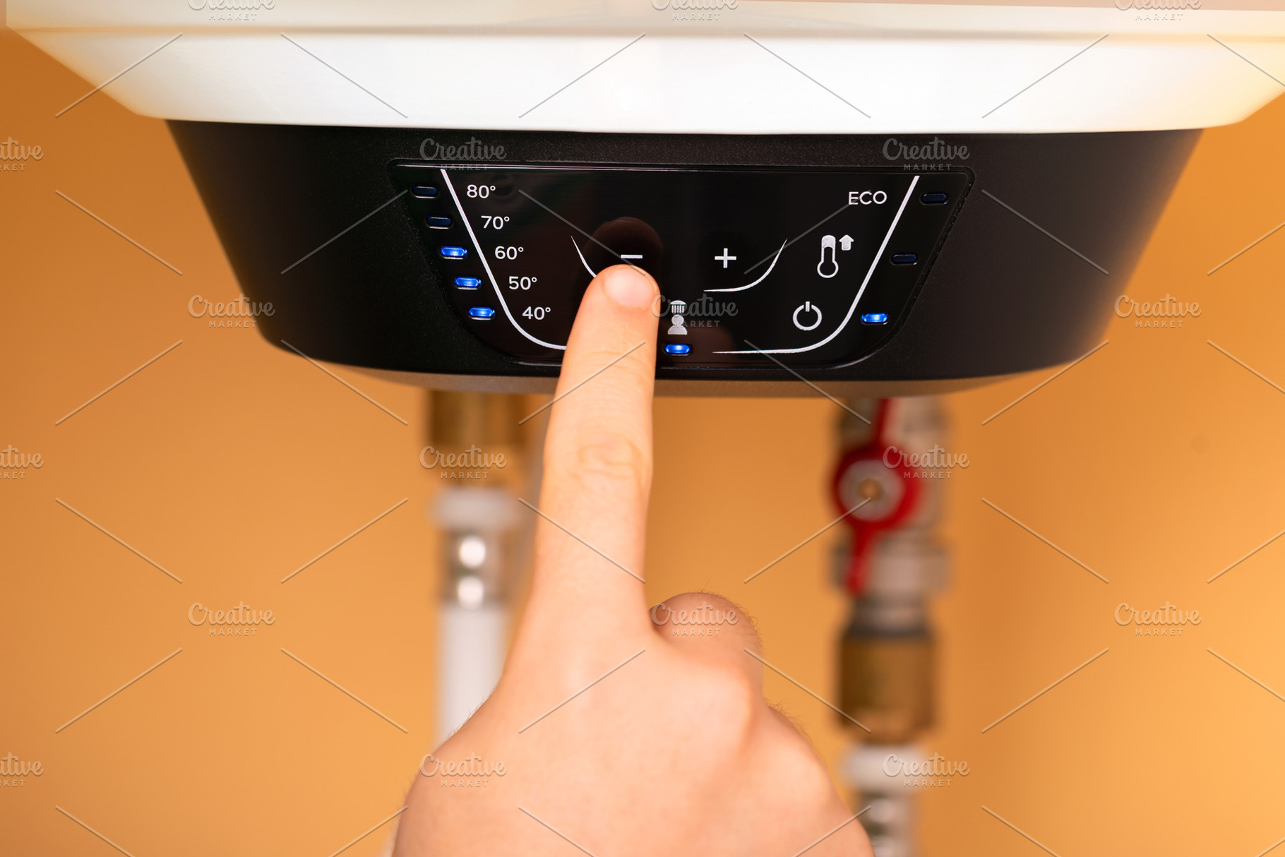Adjusting Smart Water Heater, a Technology Photo by Ales Munt