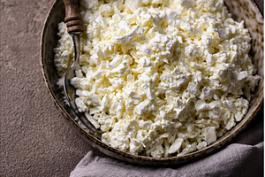 Cottage cheese on light background, a Food & Drink Photo by Yulia Furman