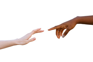 Black and white human hands reaching, a Person Photo by BOOCYS