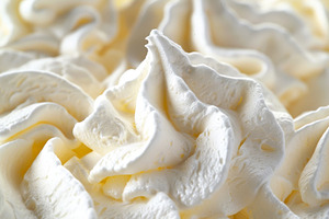 Creamy whipped topping close-up show, a Photo by Tanuart