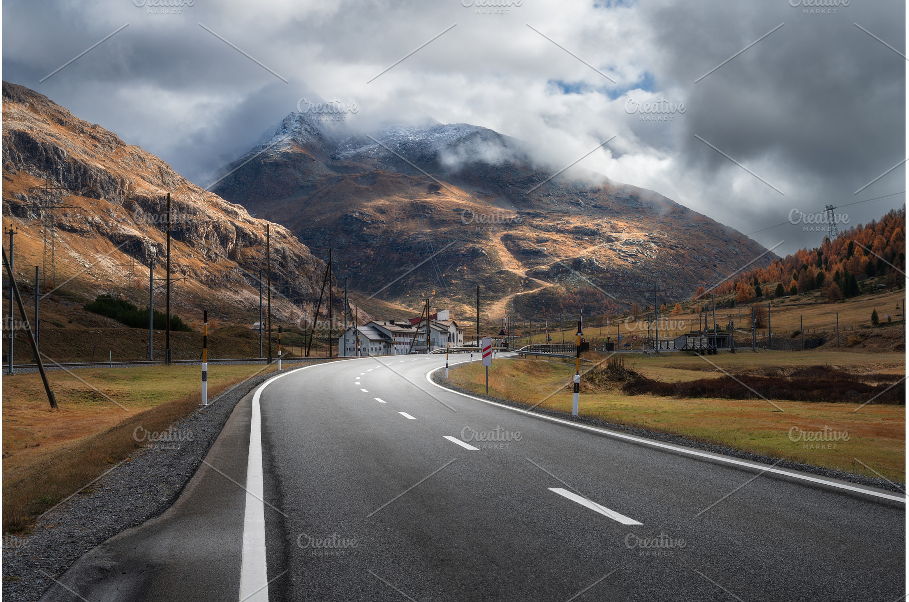 Empty asphalt road in alpine, a Nature Photo by den-belitsky